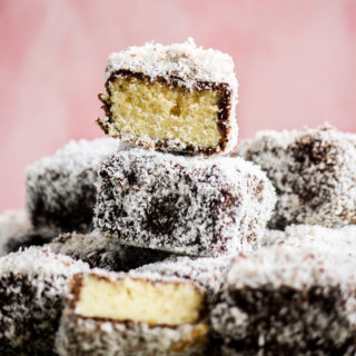 Soft sponge cake coated in dark chocolate and desiccated coconut