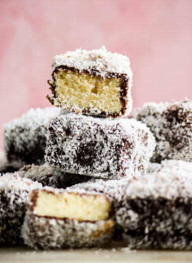 Soft sponge cake coated in dark chocolate and desiccated coconut