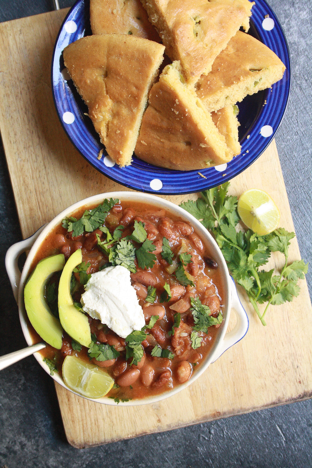 A hearty vegetarian chili with beans and veggies plus eggless, tender cornbread to go with it. Easily made vegan too!