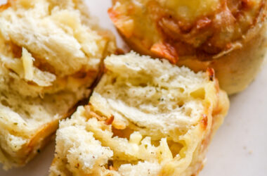 Soft and fluffy savoury rolls filled with cheddar cheese and caramelised onions!