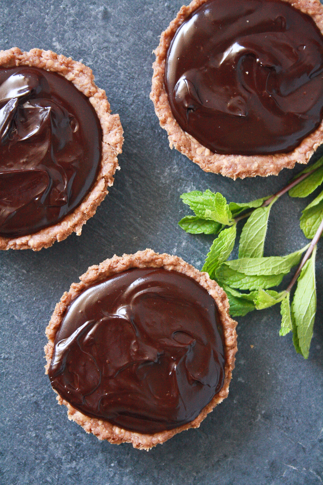 Buttery chocolate tart shells filled with a rich, fresh mint infused, chocolate ganache!