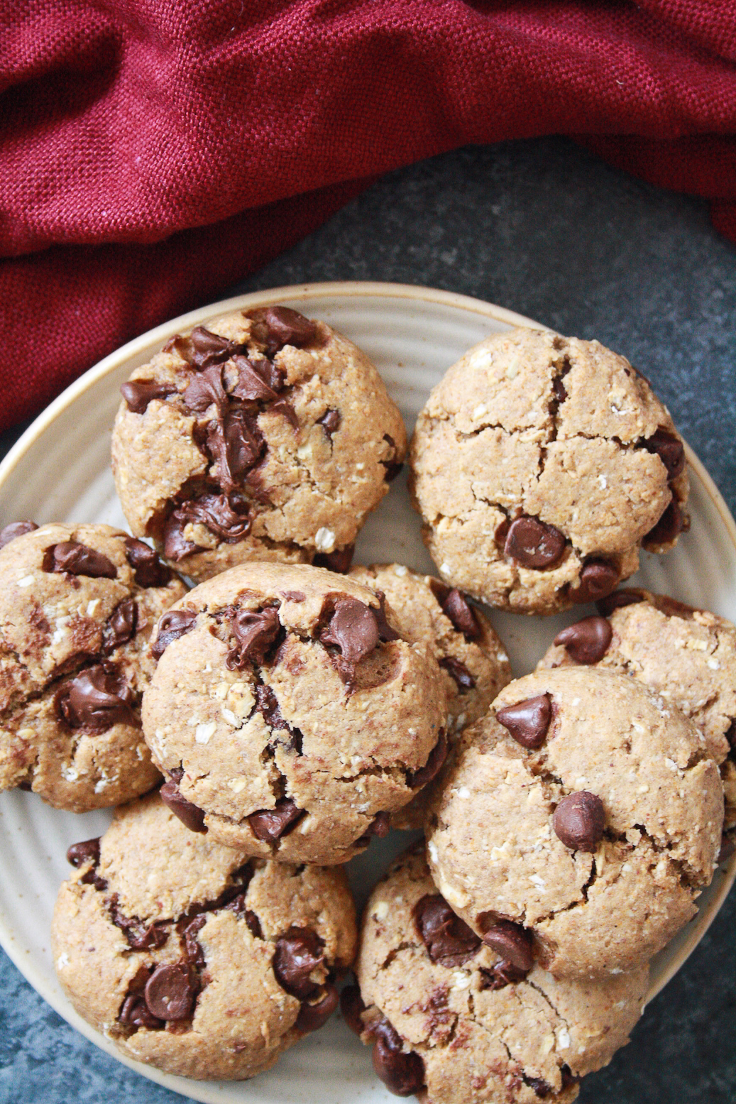 Hearty, chewy almond butter cookies made with wholewheat flour. Free of refined fat and sugar if you skip the chocolate chips!