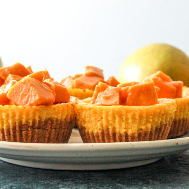 Rich, creamy mini cheesecakes with white chocolate and fresh mangoes!