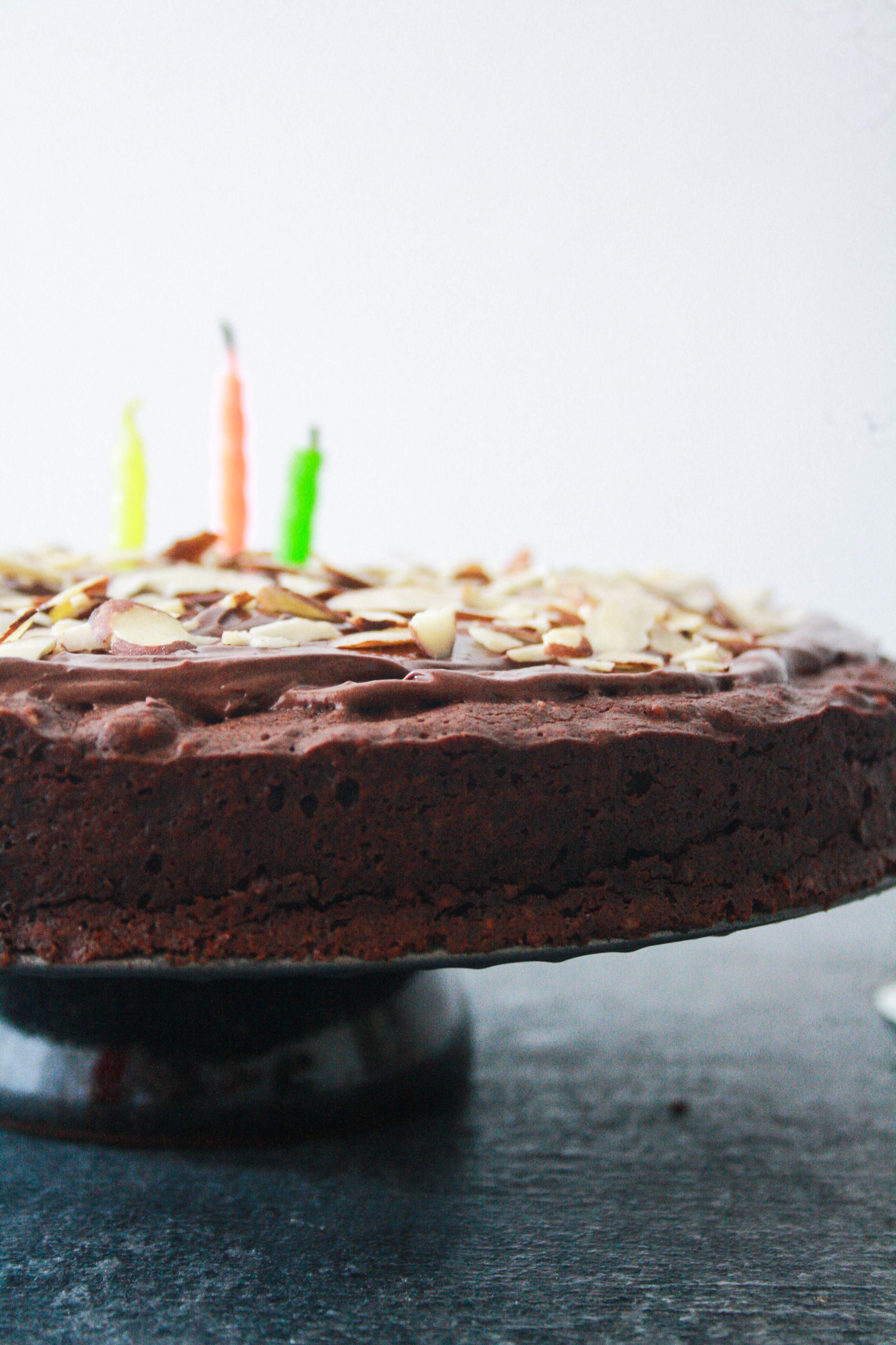 A rich, fudgy chocolate cake with coconut and almonds, topped with a silky chocolate frosting!