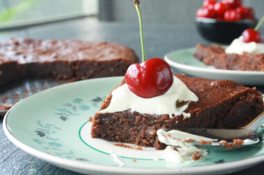 Moist and fudgy gluten-free cake made with buckwheat flour and hazelnuts