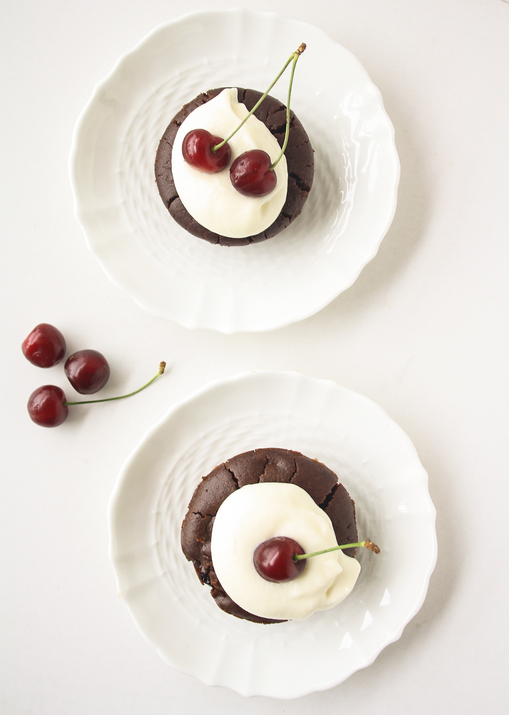 Rich, fudgy cakes filled with rum-soaked fresh cherries, served with a simple vanilla mascarpone topping!