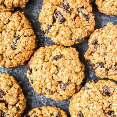 Soft and chewy spiced oatmeal raisin cookies with toasted walnuts!