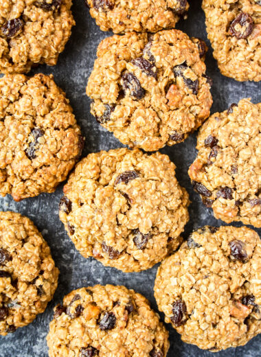 Soft and chewy spiced oatmeal raisin cookies with toasted walnuts!