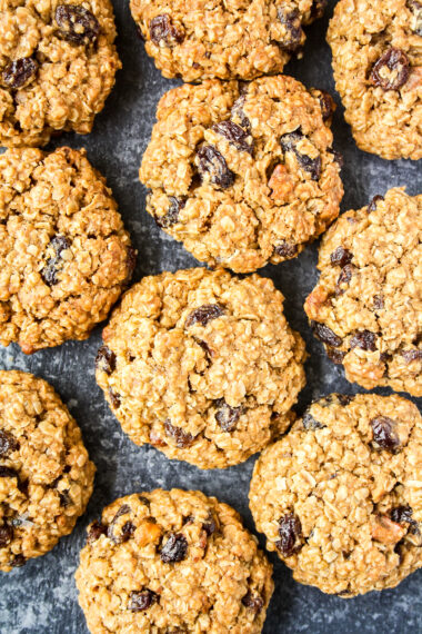 Soft and chewy spiced oatmeal raisin cookies with toasted walnuts!