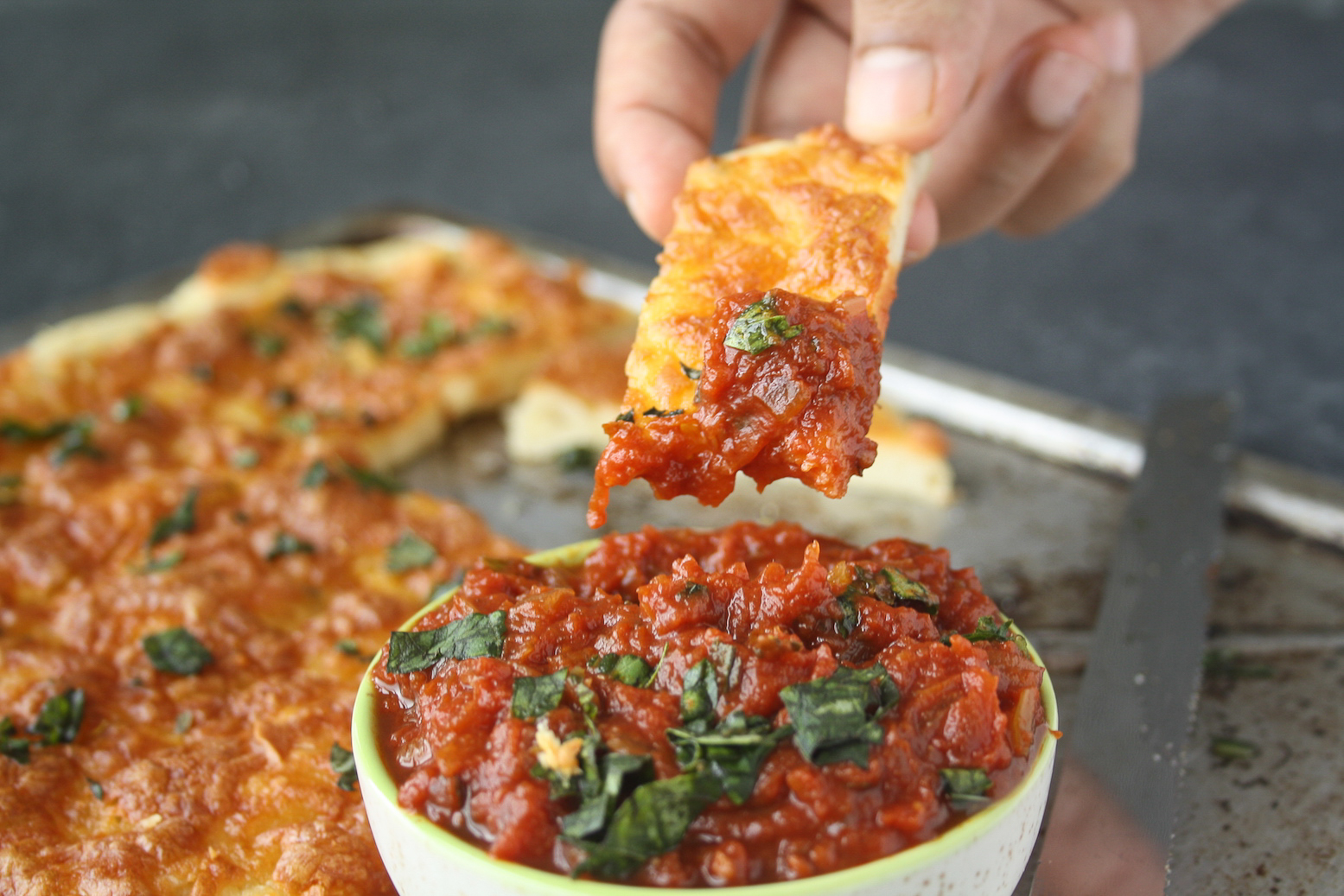 Chewy, buttery, cheesy, garlicky breadsticks with a chunky marinara sauce!
