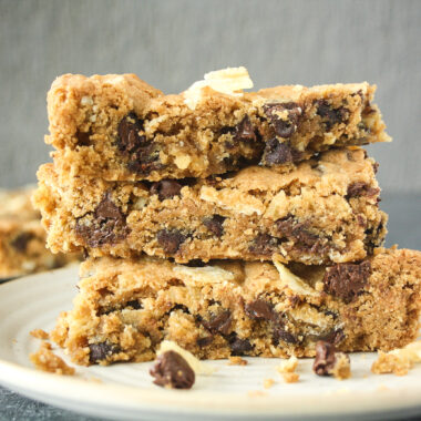 Chewy, buttery, sweet salty cookie bars filled with crushed potato chips and lots of chocolate chips!