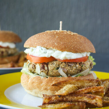 Hearty burgers with sweet potato, quinoa and kidney beans, topped with a light and creamy tzatziki