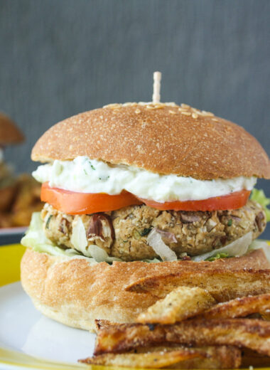 Hearty burgers with sweet potato, quinoa and kidney beans, topped with a light and creamy tzatziki