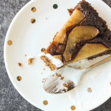 A moist pear upside-down cake with orange zest, ginger and molasses!