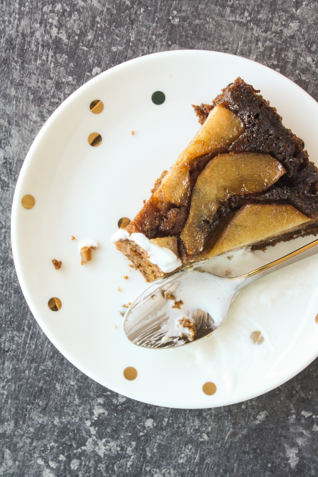 A moist pear upside-down cake with orange zest, ginger and molasses!