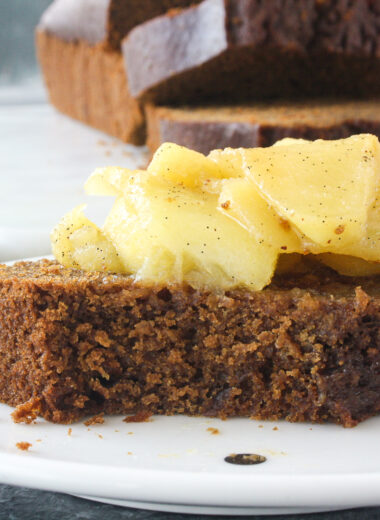 Moist, warmly spiced gingerbread cake with buttery apples cooked in whiskey!