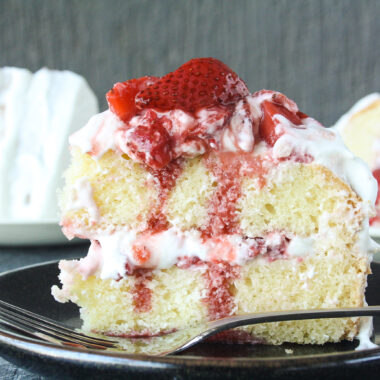 Tender butter cake layered with mascarpone cream frosting and juicy roasted strawberries!