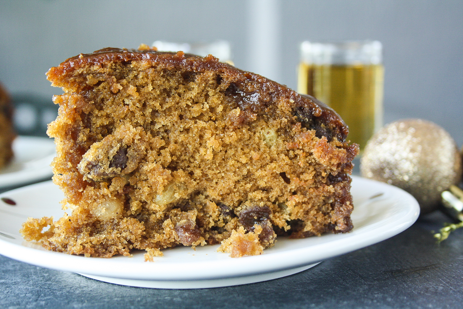 Moist and tender cake with whiskey-soaked raisins and a whiskey caramel glaze!