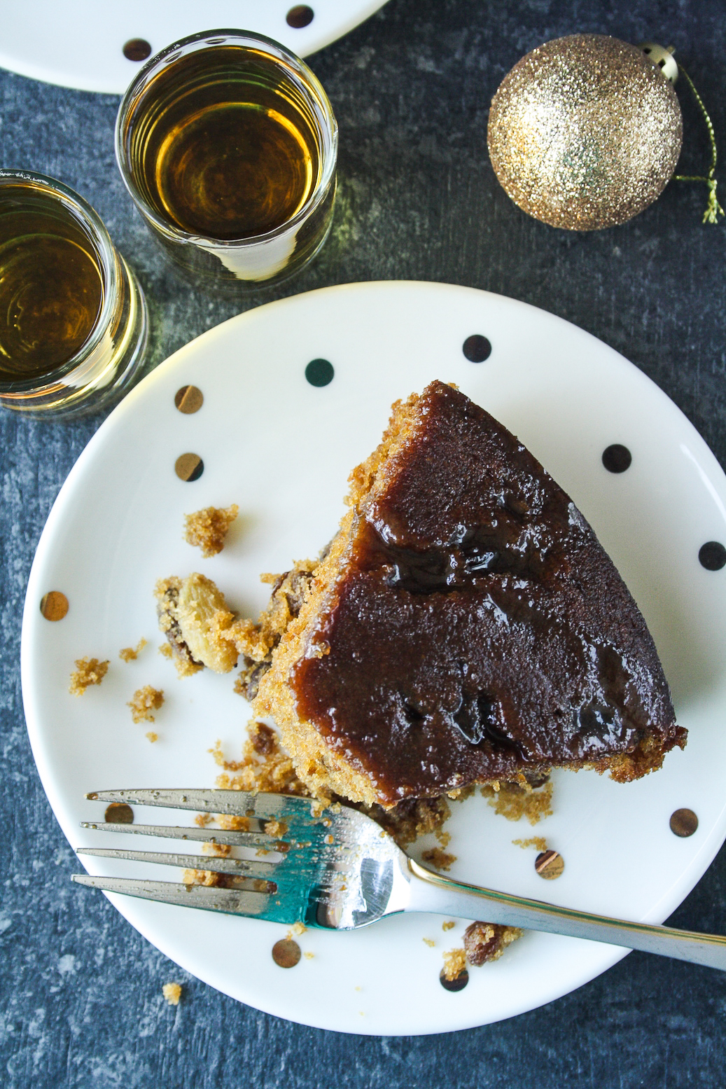 Moist and tender cake with whiskey-soaked raisins and a whiskey caramel glaze!