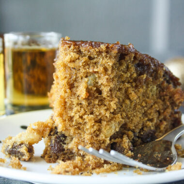 Moist and tender cake with whiskey-soaked raisins and a whiskey caramel glaze!