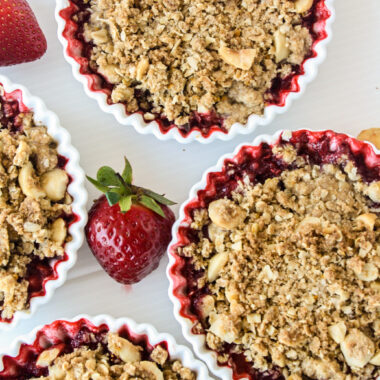 Juicy strawberries topped with a citrusy buckwheat hazelnut crumble!