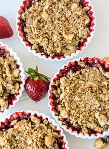 Juicy strawberries topped with a citrusy buckwheat hazelnut crumble!