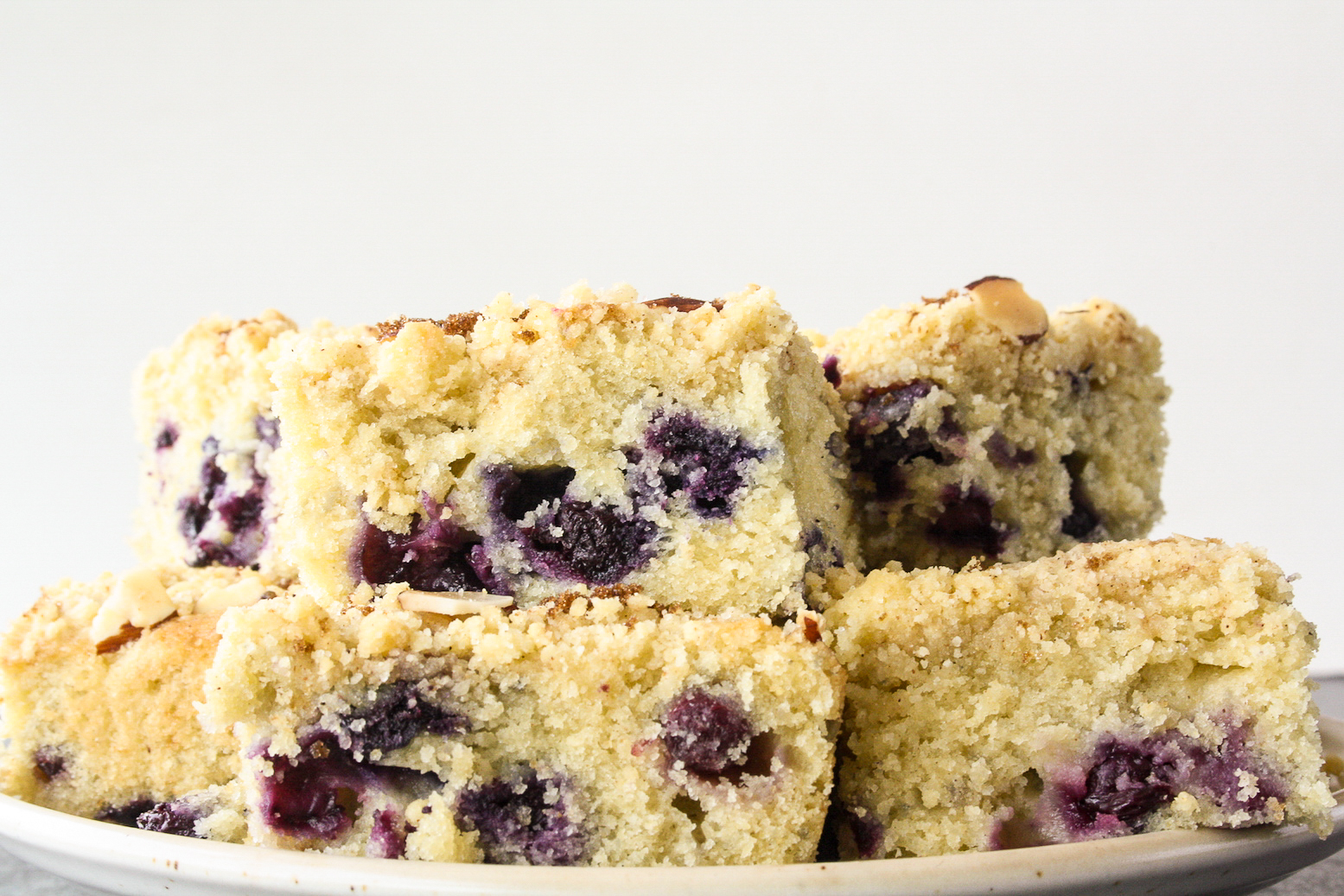 A buttery, moist blueberry cake made with cornmeal and a crunchy streusel topping!