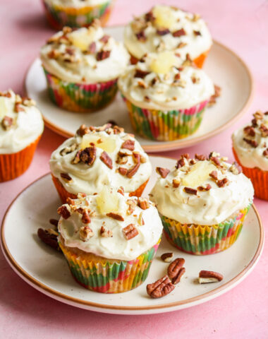 Moist and fruity banana, pineapple and coconut cupcakes with pecans and cream cheese frosting!