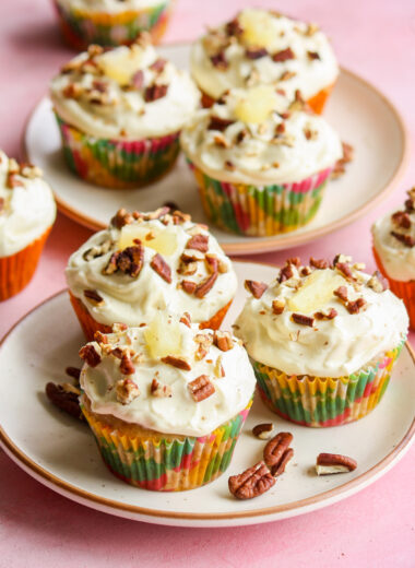 Moist and fruity banana, pineapple and coconut cupcakes with pecans and cream cheese frosting!