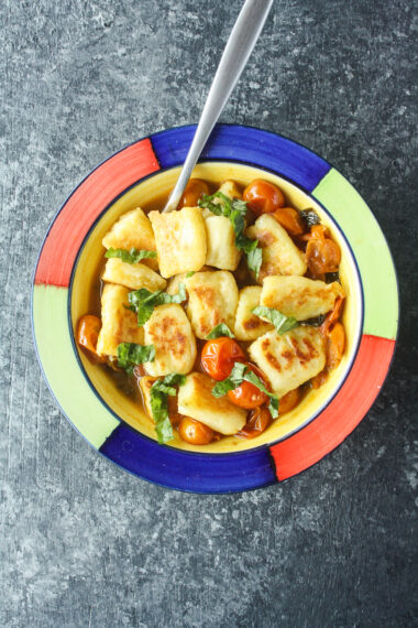 Pan-fried gnocchi in a delicious burst cherry tomato sauce!