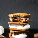 Delicious homemade graham cracker s'mores with melty chocolate and marshmallows!