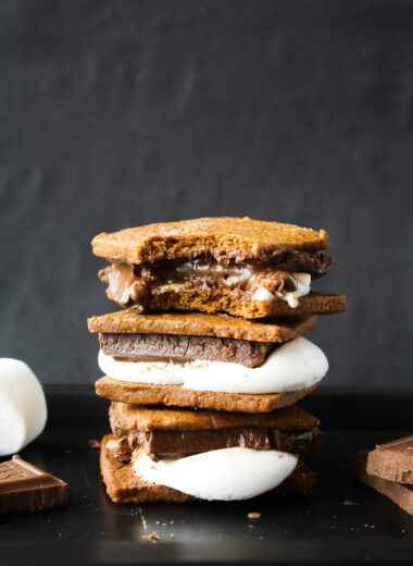 Delicious homemade graham cracker s'mores with melty chocolate and marshmallows!