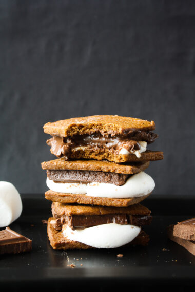 Delicious homemade graham cracker s'mores with melty chocolate and marshmallows!