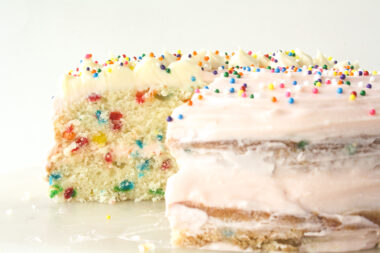Buttery layer cake with sprinkles and pink frosting!