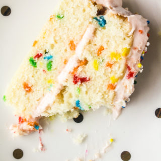 Buttery layer cake with sprinkles and pink frosting!