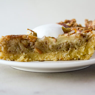 Almond frangipane tart with orange marmalade and sliced apples