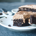 Moist, eggless chocolate and olive oil cake with a silky whipped ganache frosting