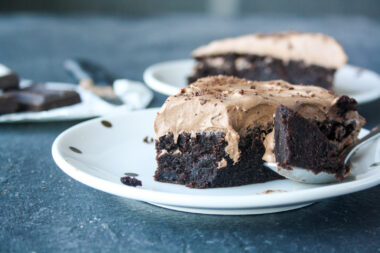 Moist, eggless chocolate and olive oil cake with a silky whipped ganache frosting