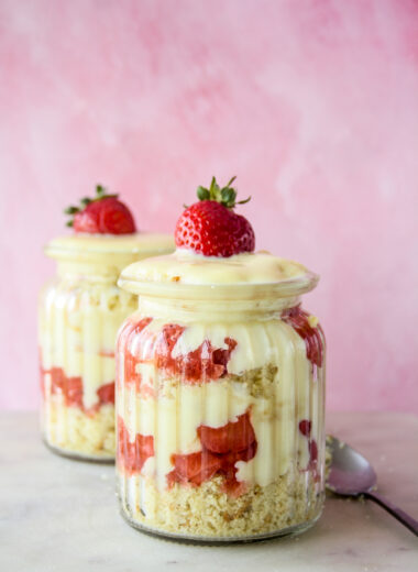 Easy trifle with layers of butter cake, eggless custard and strawberry compote!