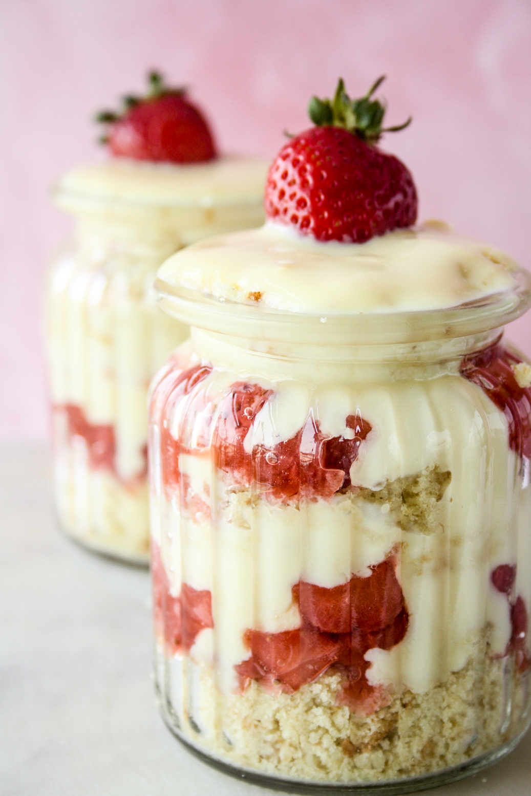Easy trifle with layers of butter cake, eggless custard and strawberry compote!