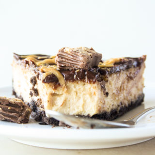 Creamy baked peanut butter cheesecake with Oreo crust and chocolate ganache