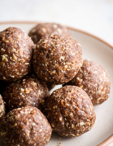Chewy, fudgy, vegan and GF energy bites with almonds, pecans and dates