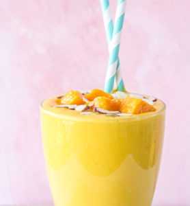 Refreshing breakfast smoothie with yoghurt and fresh mango