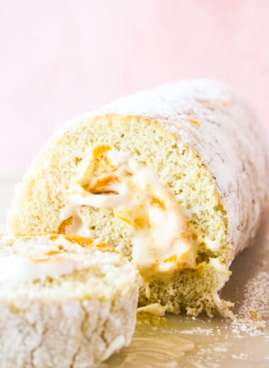 Light and fluffy roll cake with fresh mangoes and whipped cream