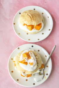 Fresh mangoes and cream sandwiched between buttermilk biscuits