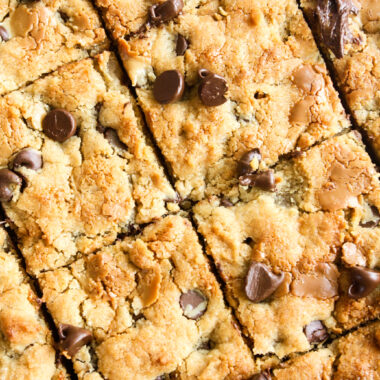 Chewy and buttery peanut butter cookie bars with melty chocolate chips!