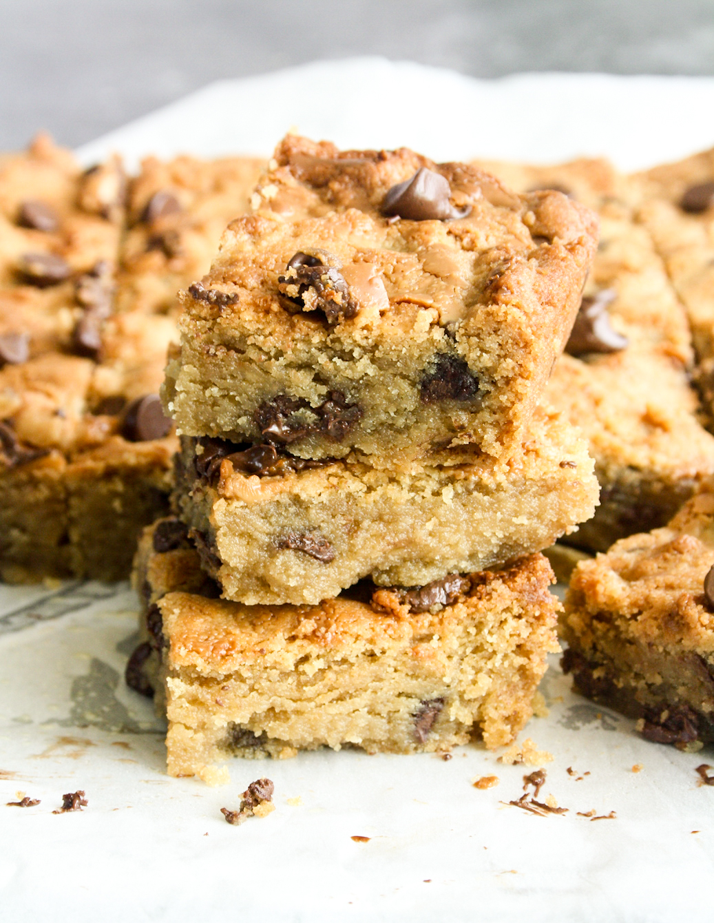 Chewy and buttery peanut butter cookie bars with melty chocolate chips!