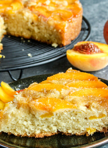 Moist and buttery cake with caramelised peaches on top