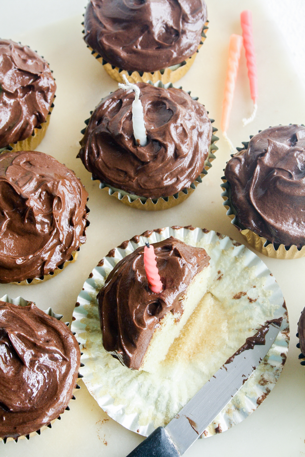 Perfect moist yellow cake cupcakes with a silky chocolate frosting