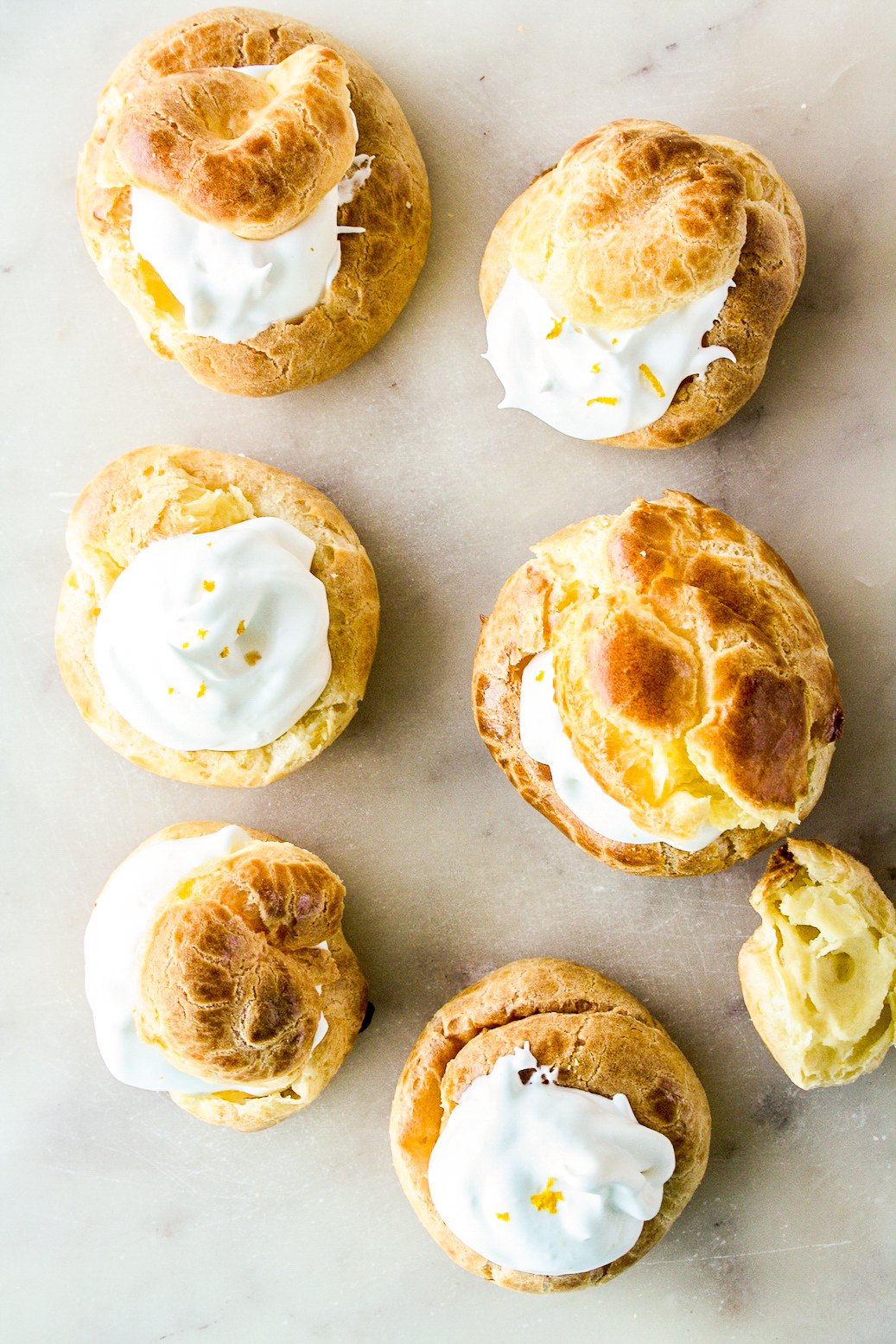 Chocolate orange creams puffs with homemade choux pastry